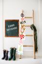 <p>Put season's greetings on full display. A rustic ladder can also hold cozy throws and blankets for chilly nights. </p><p>See more at <a href="http://www.countryliving.com/home-design/decorating-ideas/advice/g1247/holiday-decorating-1208/" rel="nofollow noopener" target="_blank" data-ylk="slk:Country Living;elm:context_link;itc:0;sec:content-canvas" class="link ">Country Living</a>. </p>