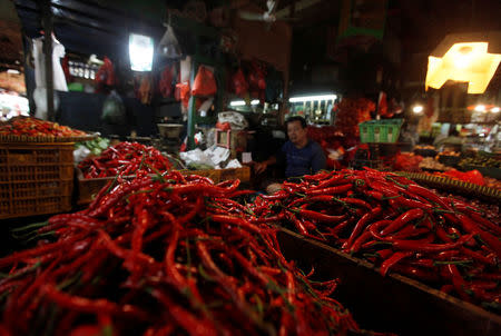Chilies are seen for sale at a traditional market in Jakarta, Indonesia December 16, 2016. REUTERS/Fatima El-Kareem