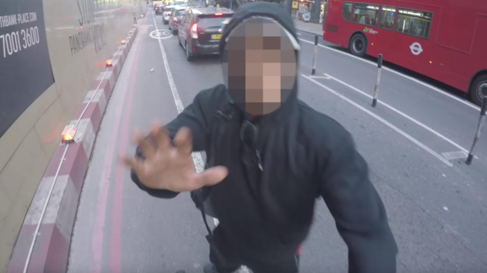 One pedestrian didn’t quite take to the air horn treatment, turning around and striking the cyclist. Source: YouTube / Reckless Bradley