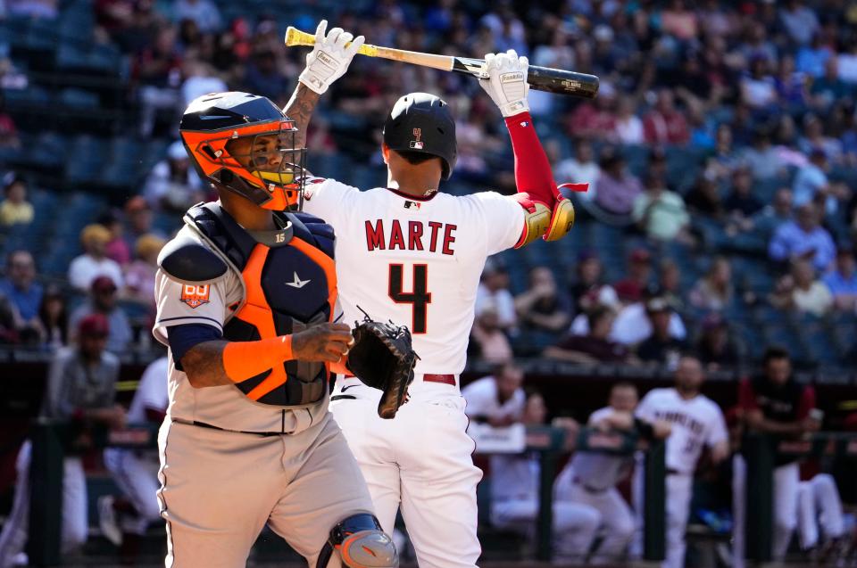 Apr 13, 2022; Phoenix, Arizona, USA; Arizona Diamondbacks second baseman Ketel Marte (4) throws his bat to the ground after striking out against the Houston Astros in the eighth inning at Chase Field.