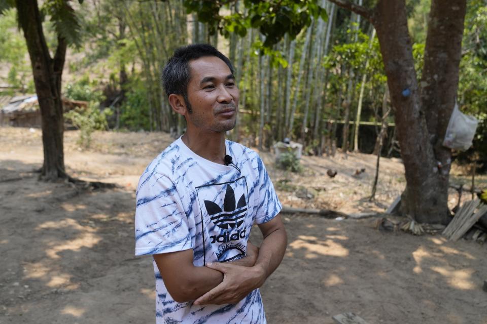 Village chief Nanthawat Tiengtrongsakun talks to The Associated Press about the Pakanyo's tribes controlled burns during interview at Chiang Mai province, Thailand, Monday, April 22, 2024. "We are the ethnic group that preserves the forest, but other people have the concern that we are destroying the forest," Tiengtrongsakun said. "My argument to them is that we have been living [here] for generations. If we are the cause of the damage, the forest around us would have to be all gone." (AP Photo/Sakchai Lalit)