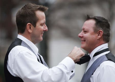 Greg and Roger prepare to marry each other in a park outside Jefferson County Courthouse in Birmingham, Alabama, in this file photo taken February 9, 2015. REUTERS/Marvin Gentry/Files