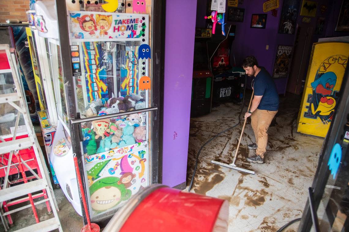 All the machines in Chris Barker’s downtown Whitesburg business “Atomic Raid Arcade” were ruined by the flood.