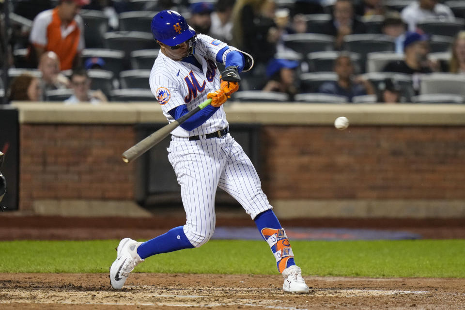 New York Mets' Mark Vientos hits a two-run home run against the Arizona Diamondbacks during the sixth inning of a baseball game Wednesday, Sept. 13, 2023, in New York. (AP Photo/Frank Franklin II)