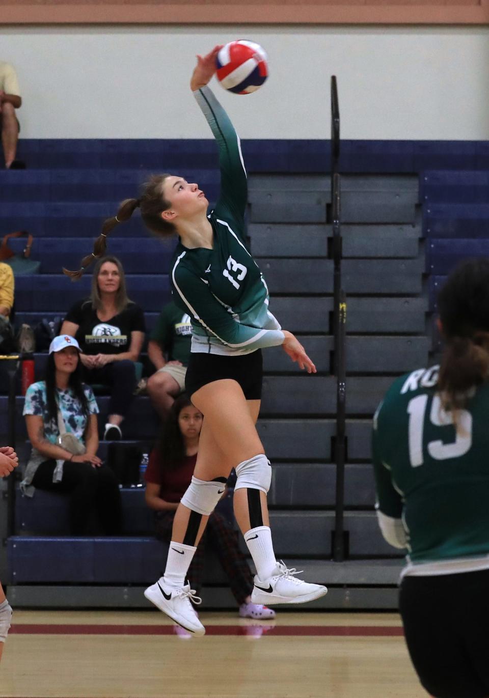 Royal High's Emily Ford goes for the spike during a match against Oxnard on Saturday, Sept. 24, 2022, at Oxnard High.