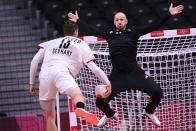 <p>France's goalkeeper Vincent Gerard prepares for a shoot during the men's preliminary round group A handball match between France and Germany of the Tokyo 2020 Olympic Games at the Yoyogi National Stadium in Tokyo on July 28, 2021. (Photo by Daniel LEAL-OLIVAS / AFP) (Photo by DANIEL LEAL-OLIVAS/AFP via Getty Images)</p> 