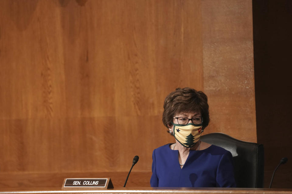 Sen. Susan Collins, R-Maine, listens to Surgeon General Jerome Adams give an opening statement during a Senate Health, Education, Labor and Pensions Committee hearing to discuss vaccines and protecting public health during the coronavirus pandemic on Capitol Hill, Wednesday, Sept. 9, 2020, in Washington. (Greg Nash/Pool via AP)