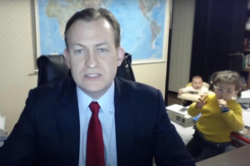 Robert E. Kelly during his live BBC interview in 2017 as he’s interrupted by his daughter Marion and her younger brother James. BBC News