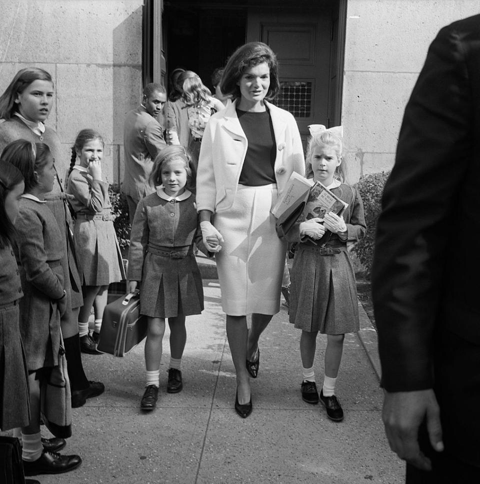 <p>Jacqueline Kennedy picks up Caroline, almost 7, and her niece, Sydney Lawford, 8, at the end of the school day at the Convent of the Sacred Heart on East 91st Street in New York City.</p>