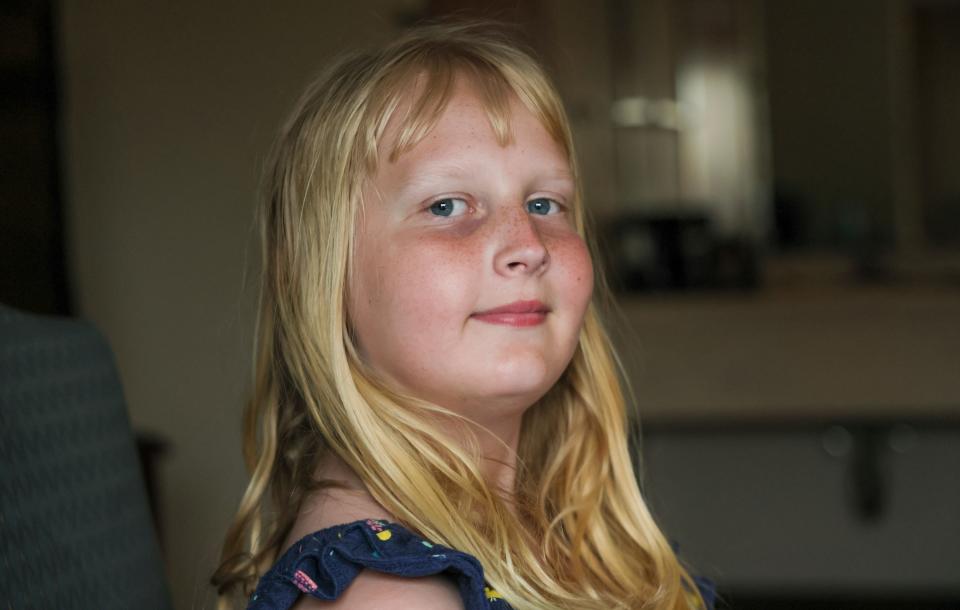 Flower Nichols, an 11-year-old transgender girl, poses for a portrait in Chicago on June 13, 2023.