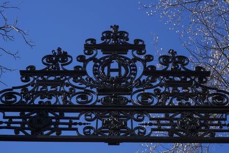 An "H" marks a gate into Harvard Yard at Harvard University in Cambridge, Massachusetts January 20, 2015. REUTERS/Brian Snyder