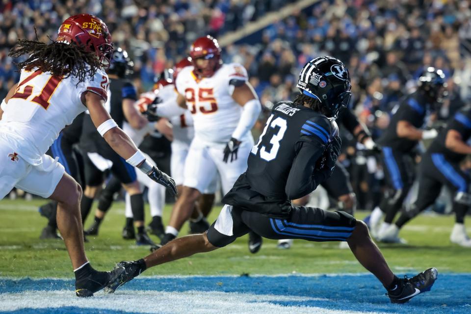 BYU Cougars wide receiver Jojo Phillips (13) makes a touchdown catch, leaving the Iowa State Cyclones up 10-7 after the PAT, at LaVell Edwards Stadium in Provo on Saturday, Nov. 11, 2023. | Spenser Heaps, Deseret News