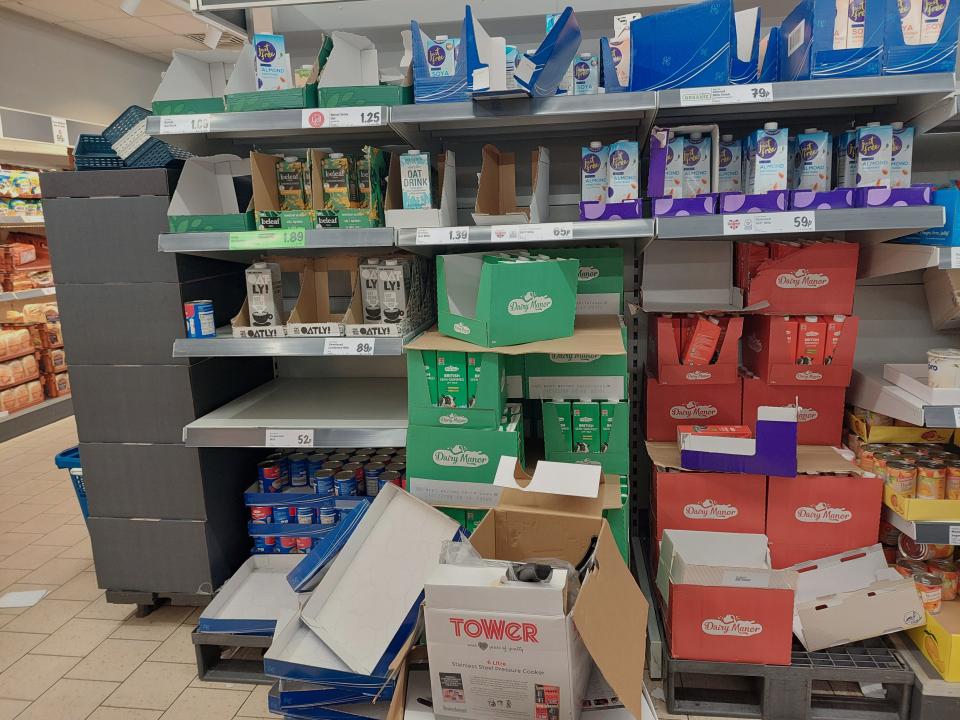 Lidl milk aisle - boxes in the middle of walkway