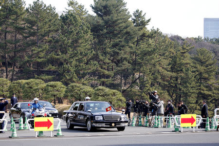 A vehicle transporting Japan's Emperor Akihito and Empress Michiko, appears at the Hanzomon gate of the Imperial Palace as the monarchs are heading to a ceremony marking the 30th anniversary of their enthronement in Tokyo, Japan, February 24, 2019. REUTERS/Issei Kato