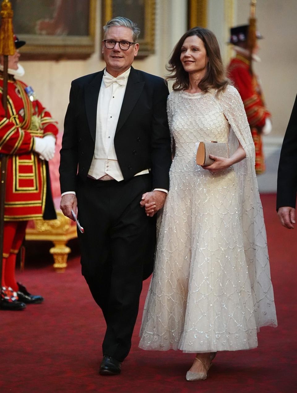 Lady Starmer wore a sparkly £725 cape dress to the state banquet for Emperor Naruhito and his wife Empress Masako of Japan at Buckingham Palace