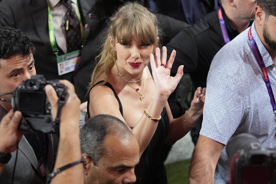 Taylor Swift moves on the field after the NFL Super Bowl 58 football game between the San Francisco 49ers and the Kansas City Chiefs, Sunday, Feb. 11, 2024, in Las Vegas. The Chiefs won 25-22. (AP Photo/Frank Franklin II)