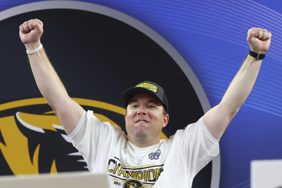 Missouri coach Eliah Drinkwitz celebrates the team's win over Ohio State in the Cotton Bowl NCAA college football game Friday, Dec. 29, 2023, in Arlington, Texas. (AP Photo/Richard W. Rodriguez)