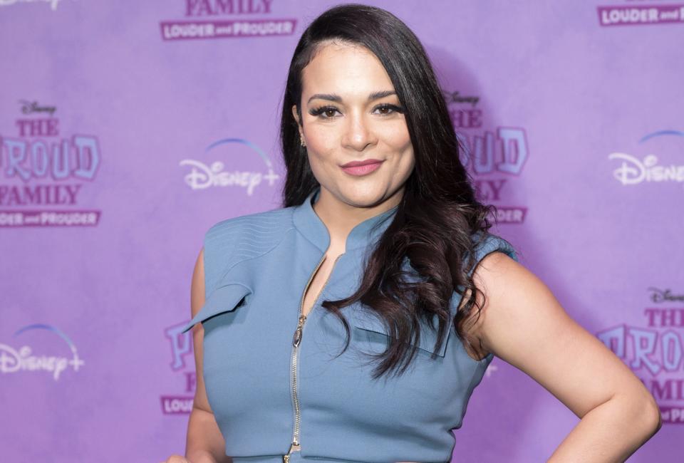 Alisa Reyes smiles at the premiere of The Proud Family: Louder and Prouder.