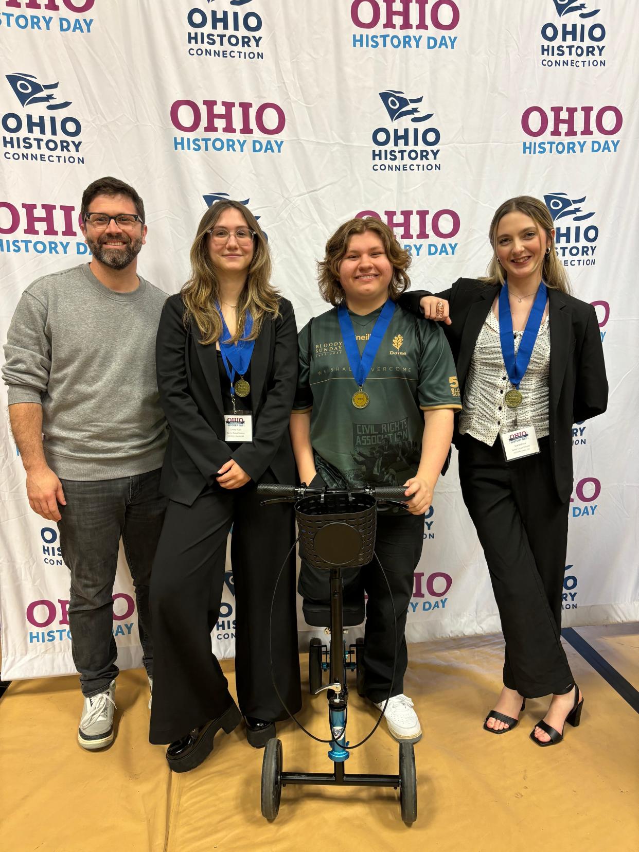 Maysville High School History teacher Lance McGee, from left, is shown with Emma Rush, Will Stoepfel and Scarlet Price. All three students qualified for the 2024 National History Day national competition held at the University of Maryland this year.