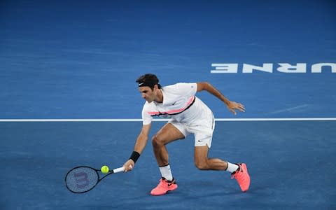 AFP - Credit: Switzerland's Roger Federer hits a return against France's Richard Gasquet during their men's singles third round match on day six of the Australian Open tennis tournament in Melbourne on January 20, 2018