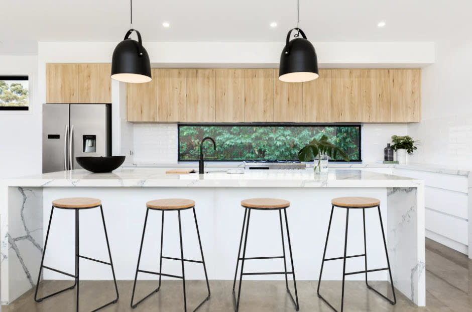 set of four stools next to kitchen counter