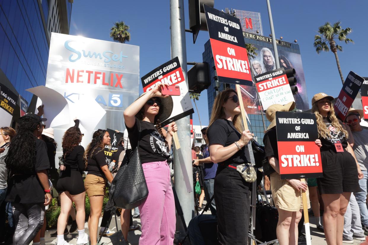 Pickets stand outside Netflix headquarters on Friday, July 14, 2023. Earlier, SAG-AFTRA authorized their members to strike after contract talks with movie and television producers broke down on July 13. The actors join members of the Writers Guild of America which has been on the picket lines for over two months.