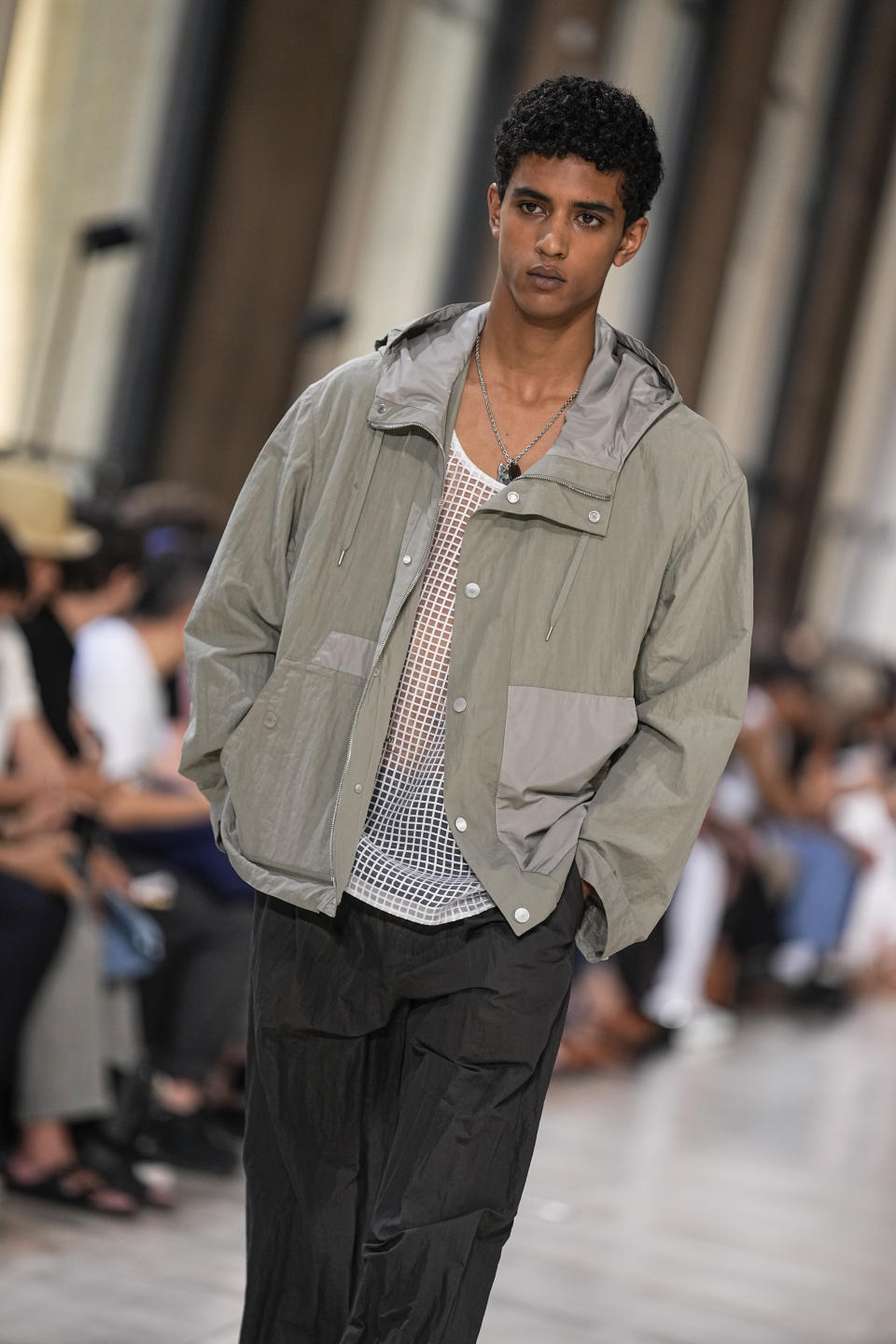 A model wears a creation for the Hermes Menswear Spring/Summer 2024 fashion collection presented in Paris, Saturday, June 24, 2023. (AP Photo/Michel Euler)