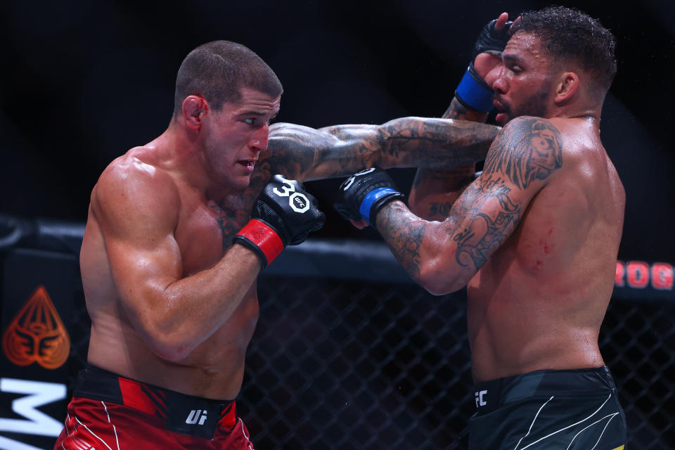 Jun 10, 2023; Vancouver, BC, Canada; Marc-Andre Barriault lands a hit against Eryk Anders during UFC 289 at Rogers Arena. Mandatory Credit: Sergei Belski-USA TODAY Sports