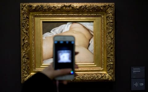 The canvas, which now hangs in Paris’ Orsay museum, continues to court controversy after Facebook censored the image - Credit:  Francois Mori/ AP