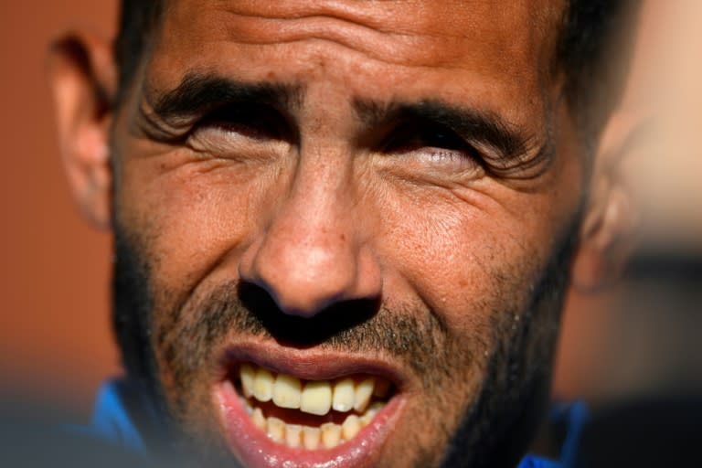 Boca Juniors striker Carlos Tevez says the displaced final will be "weird"