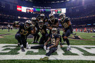 <p>New Orleans Saints Justin Hardee (center) celebrates with special teams teammates posing for a photo in the endzone after a blocked punt for a touchdown against the Tampa Bay Buccaneers during the first quarter of a game at the Mercedes-Benz Superdome. Mandatory Credit: Derick E. Hingle-USA TODAY Sports </p>