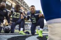 Sep 23, 2018; Seattle, WA, USA; Seattle Seahawks quarterback Russell Wilson (3) leads a prayer after a game against the Dallas Cowboys at CenturyLink Field. The Seahawks won 24-13. Mandatory Credit: Troy Wayrynen-USA TODAY Sports