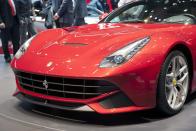 The New Ferrari F12 Berlinetta is shown during the press day at the Geneva International Motor Show in Geneva, Switzerland, Tuesday, March 6, 2012. The Motor Show will open its gates to the public from March 8 to 18, presenting more than 260 exhibitors and more than 180 world and European premieres. (AP Photo/Keystone, Sandro Campardo)