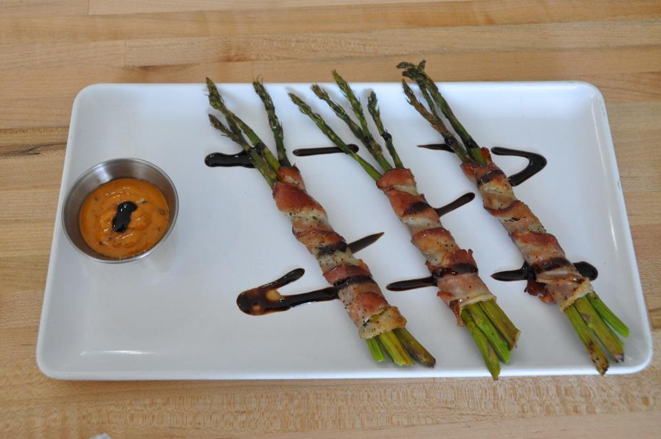 With a green St. Patrick's theme, asparagus wrapped in bacon is one of the featured appetizers at Stonerail Market for the Capital Crawl Saturday, March 16.