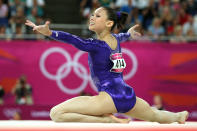 LONDON, ENGLAND - JULY 29: Kyla Ross of the United States competes in the floor exercise in the Artistic Gymnastics Women's Team qualification on Day 2 of the London 2012 Olympic Games at North Greenwich Arena on July 29, 2012 in London, England. (Photo by Ronald Martinez/Getty Images)