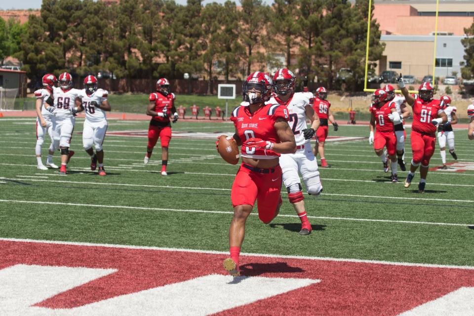 Devyn Perkins returns an interception for a touchdown during Dixie's spring game. DSU's defense was dominant over the Trailblazer offense.