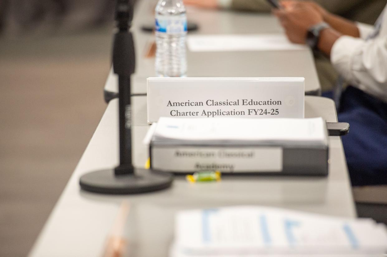 American Classical Education's application sits on a table during the Jackson-Madison County School Board meeting on Thursday, Apr. 27, 2023. 