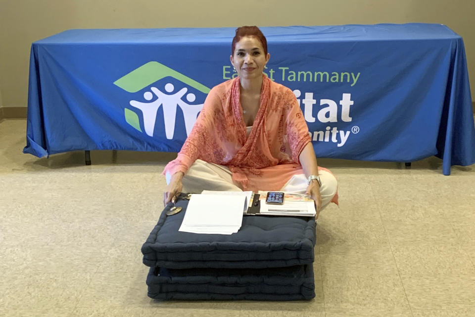 Stephanie Osborne poses for a photo in Slidell, La., where she leads a six-week mindfulness course put on by East St. Tammany Habitat for Humanity and the Northshore Community Foundation.(Kentrell Jones via AP)