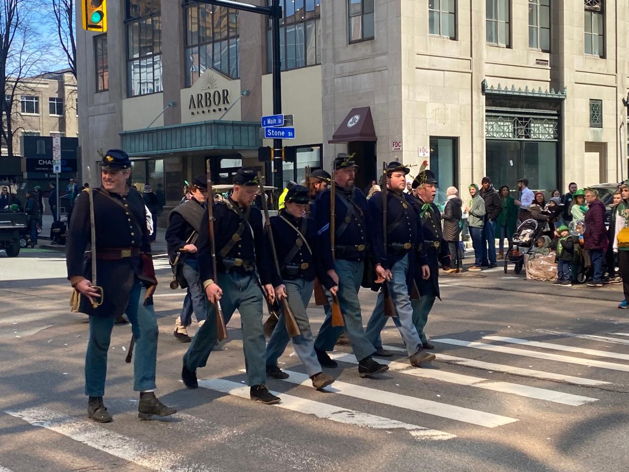 Members of the Rochester Excelsior Brigade Fife and Drum Corps march in the St. Patrick's Day Parade on March 16, 2024.