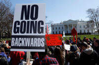 Protesters demonstrate against U.S. President Donald Trump and his plans to end Obamacare outside the White House in Washington, U.S., March 23, 2017. REUTERS/Kevin Lamarque