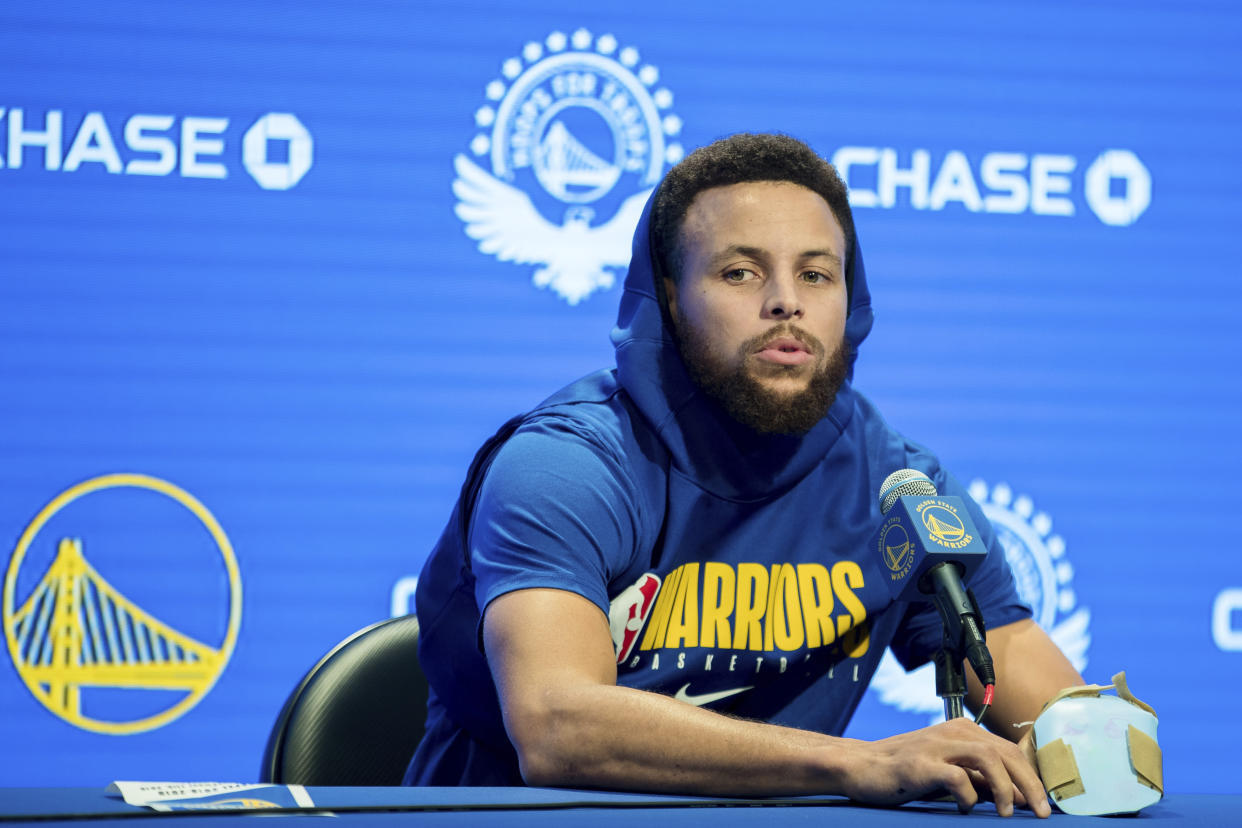 Golden State Warriors' Stephen Curry gives a press conference before an NBA basketball game against the Utah Jazz in San Francisco, Monday, Nov. 11, 2019. (AP Photo/John Hefti)