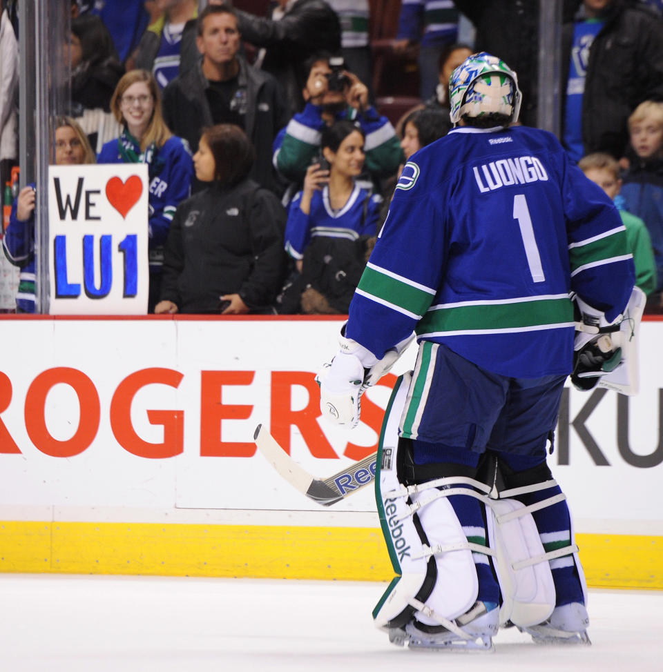 VANCOUVER, CANADA - DECEMBER 1: A fan shows her support for Roberto Luongo #1 of the Vancouver Canucks during warm-ups before the game against the Nashville Predators at Rogers Arena on December 1, 2011 in Vancouver, British Columbia, Canada. (Photo by Derek Leung/Getty Images)