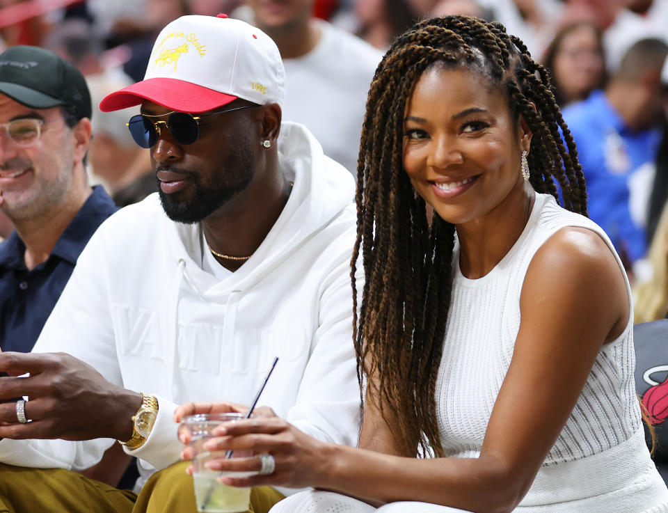 <p>Dwyane Wade heads back to his Miami stomping grounds with wife Gabrielle Union to watch game two of the Eastern Conference Semifinals between the Miami Heat and the Philadelphia 76ers on May 4 at FTX Arena.</p>