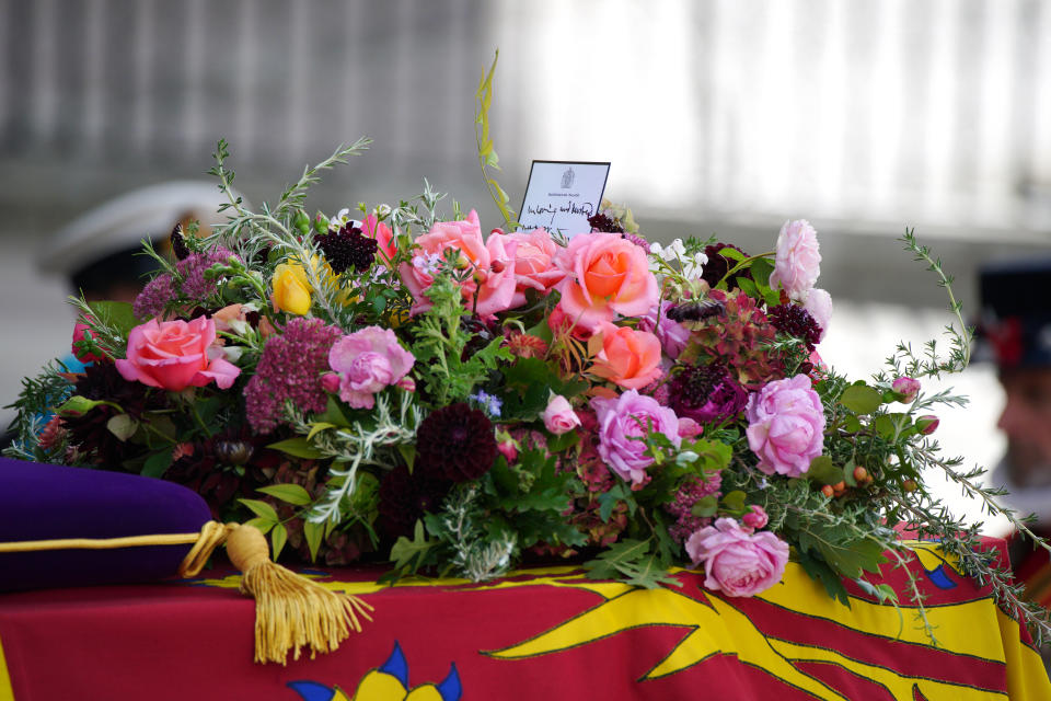 <p>The coffin of Queen Elizabeth II with a message on top from King Charles III being carried by pallbearers leaving the State Funeral held at Westminster Abbey, London. Picture date: Monday September 19, 2022. (Photo by Peter Byrne/PA Images via Getty Images)</p> 