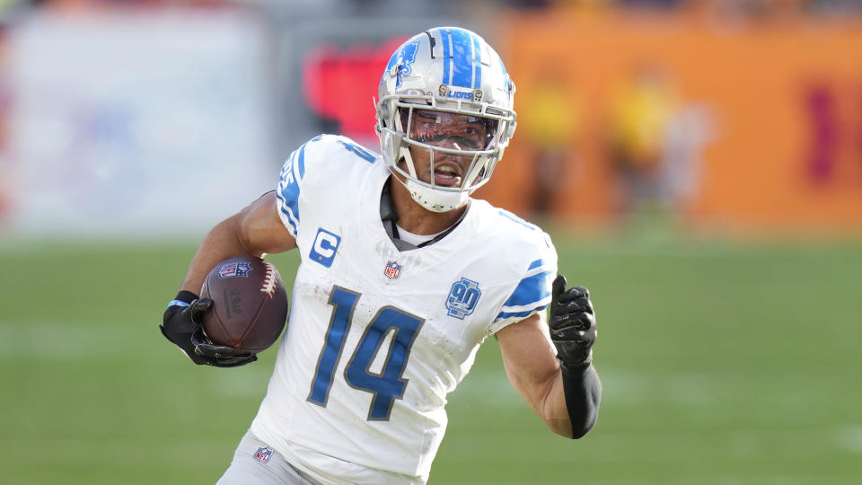 Detroit Lions wide receiver Amon-Ra St. Brown scores on a 27-yard touchdown reception against the Tampa Bay Buccaneers during the first half of an NFL football game Sunday, Oct. 15, 2023, in Tampa, Fla. (AP Photo/Chris O'Meara)