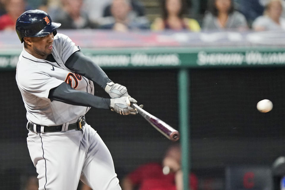 Detroit Tigers' Jonathan Schoop hits a two run single in the seventh inning in the first baseball game of a doubleheader against the Cleveland Indians, Wednesday, June 30, 2021, in Cleveland. (AP Photo/Tony Dejak)