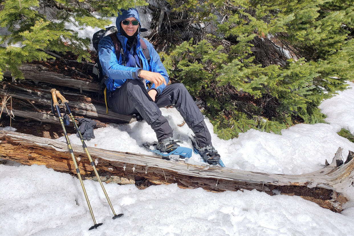 A member of Vibe Tribe Adventures rests from snowshoeing. (Courtesy Vibe Tribe Adventures)