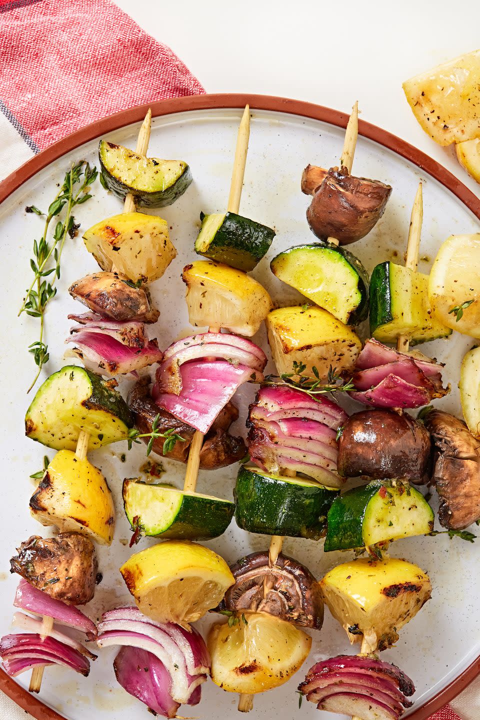 <p>*The* perfect combination of textures. Brushing the veggies with a garlicky herb oil makes all the difference. </p><p>Get the recipe from <a href="https://www.delish.com/cooking/recipe-ideas/a32675717/veggie-kabobs/" rel="nofollow noopener" target="_blank" data-ylk="slk:Delish;elm:context_link;itc:0;sec:content-canvas" class="link ">Delish</a>.</p>