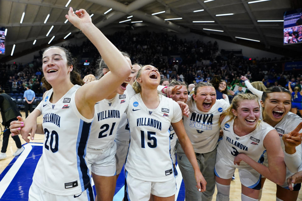 Villanova players celebrate after winning a second-round college basketball game against Florida Gulf Coast in the NCAA Tournament, Monday, March 20, 2023, in Villanova, Pa. (AP Photo/Matt Rourke)