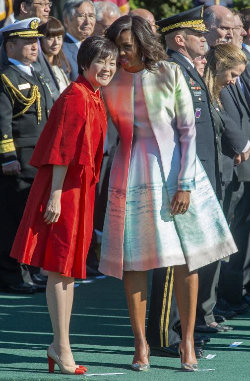 Michelle Obama and Akie Abe of Japan on the South Lawn of the White House on April 28, 2015, in Washington, DC